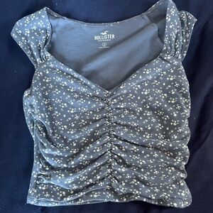 Hollister floral rouched blue tee, size small
